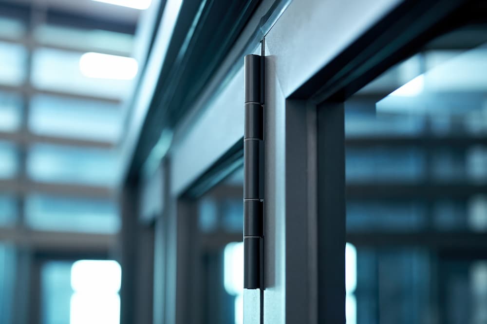 Aluminium door hinge close up